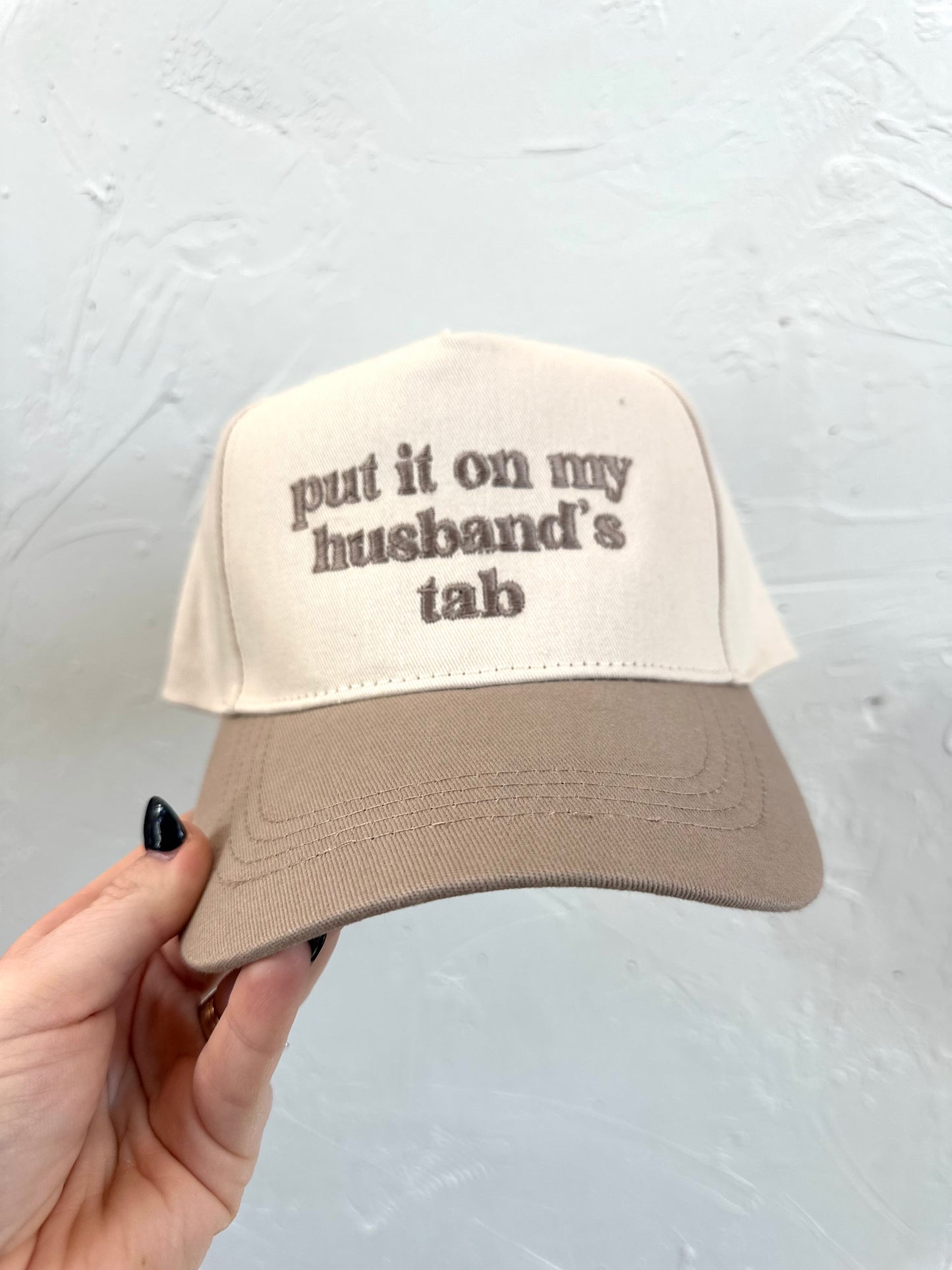 Put It On My Husbands Tab Trucker Hat